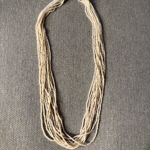 Vintage Multi-Strand Cream Seed Bead Necklace – Layered Statement PieceA beautif